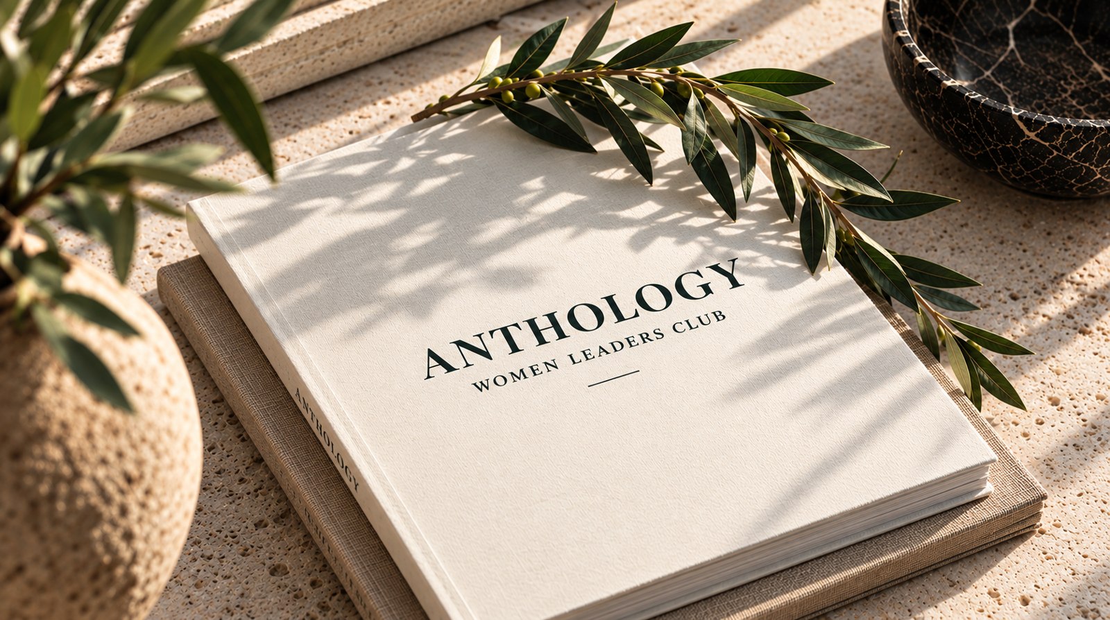 Books and journal on a table, representing shared stories